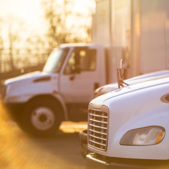 box trucks in a parking lot